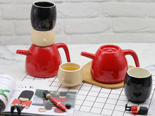 Load image into Gallery viewer, Steti Guardian Teapots set, with two cups and teapot, features traditional Royal Guard of GB
